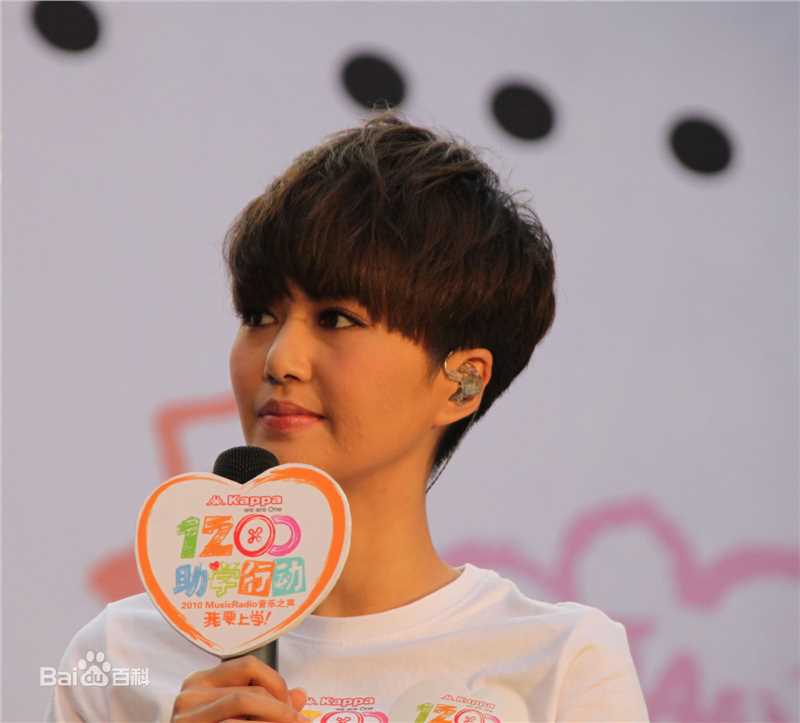 谭维维(Sitar tan)我要上学助学行动性感图片图集