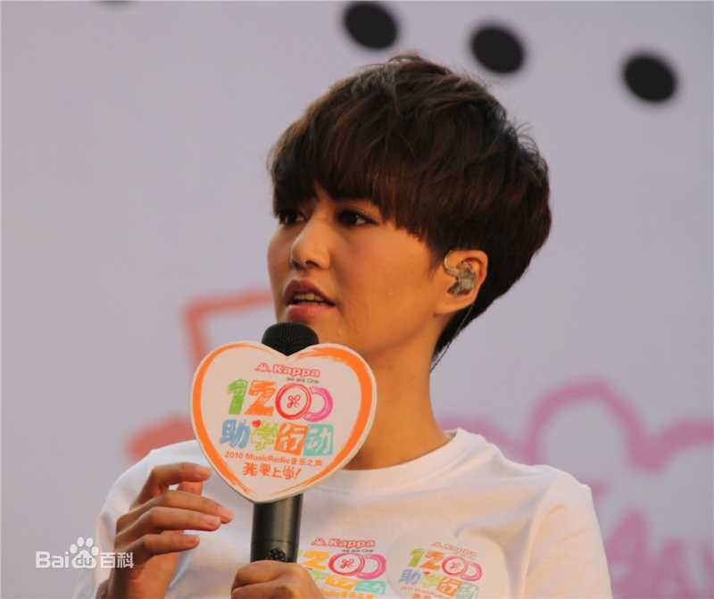 谭维维(Sitar tan)我要上学助学行动性感图片图集