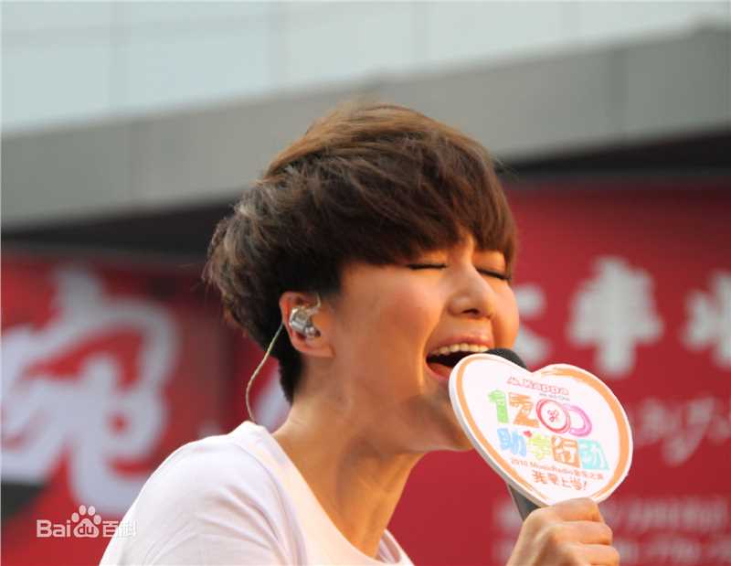 谭维维(Sitar tan)我要上学助学行动性感图片图集