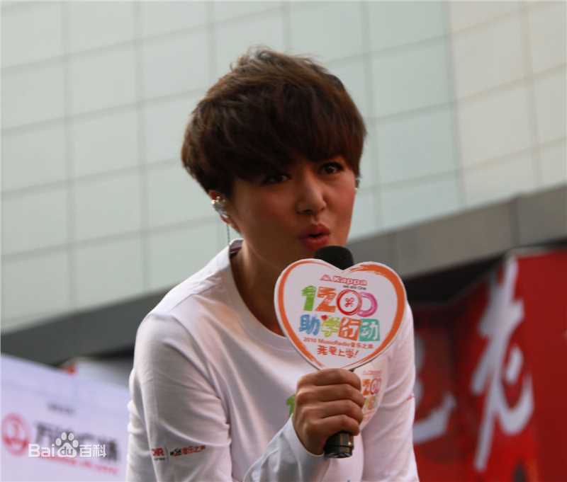 谭维维(Sitar tan)我要上学助学行动性感图片图集