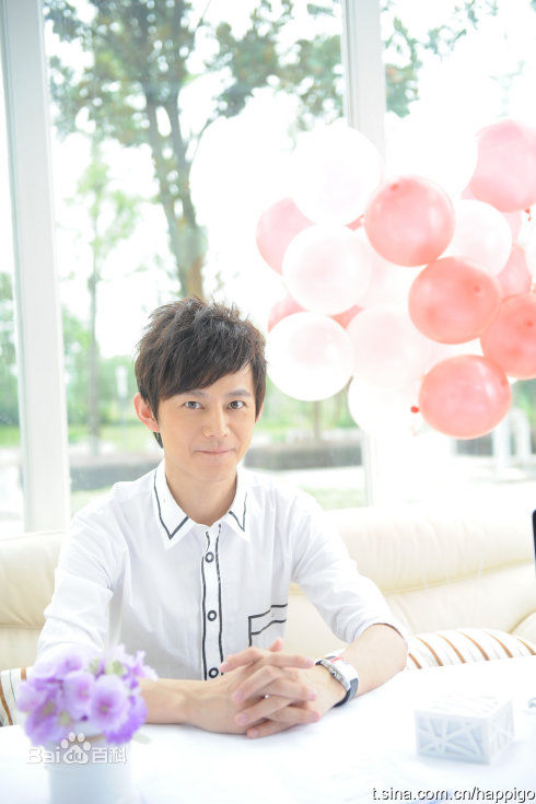 何炅(He Jiong)快乐购四周年代言图片图册