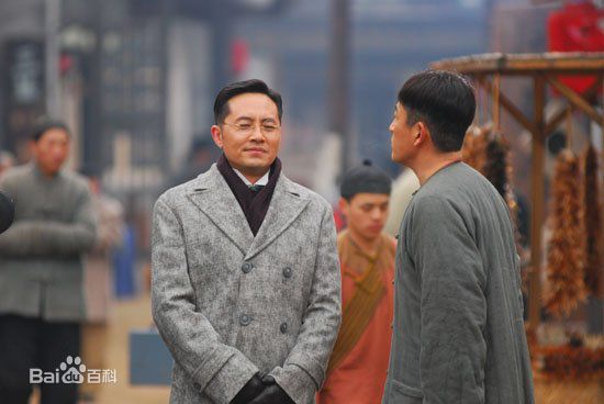 谭洋在《草根王》饰吴本正中的