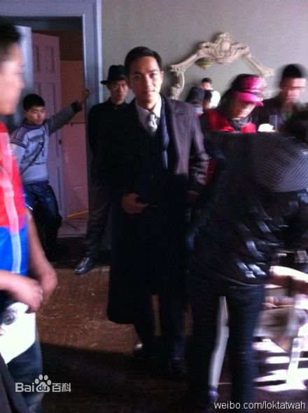 骆达华(Ken Lok Daat Wah)给野兽献花素颜照壁纸