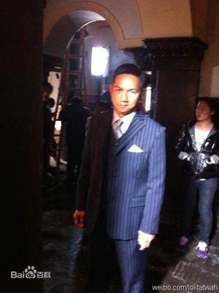 骆达华(Ken Lok Daat Wah)给野兽献花素颜照壁纸