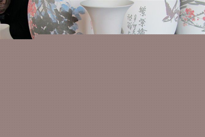 王国勋画瓷前后照片