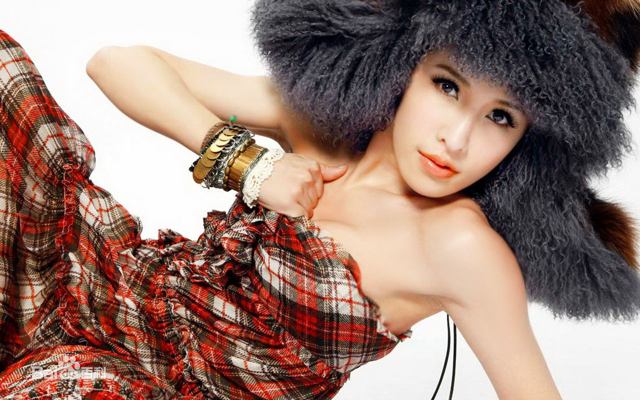 最新萧亚轩(Elva Hsiao)在专辑《三面夏娃》中的壁纸