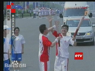 马可(Michael)奥运火炬手前后照片