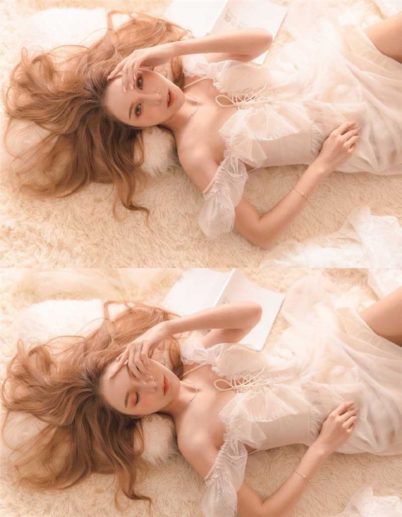 金发女郎白皙的瓜子脸酥胸半露极品大长腿性感