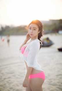 特别专辑阳光女孩海边摆拍图片